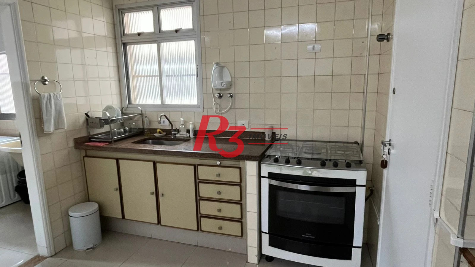 Apartamento com 3 dormitórios à venda, 130 m² por R$ 1.300.000,00 - Gonzaga - Santos/SP