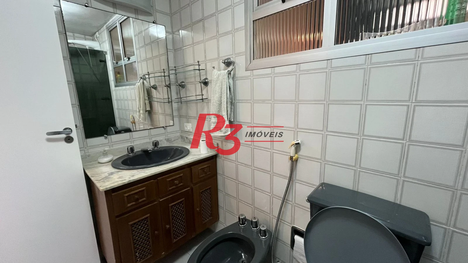 Apartamento com 3 dormitórios à venda, 130 m² por R$ 1.300.000,00 - Gonzaga - Santos/SP