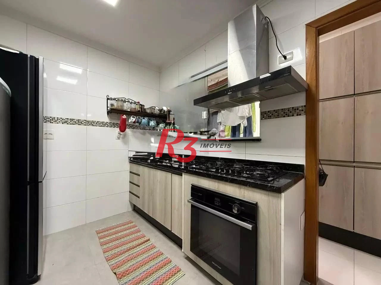 Village com 3 dormitórios à venda, 110 m² por R$ 750.000,00 - José Menino - Santos/SP