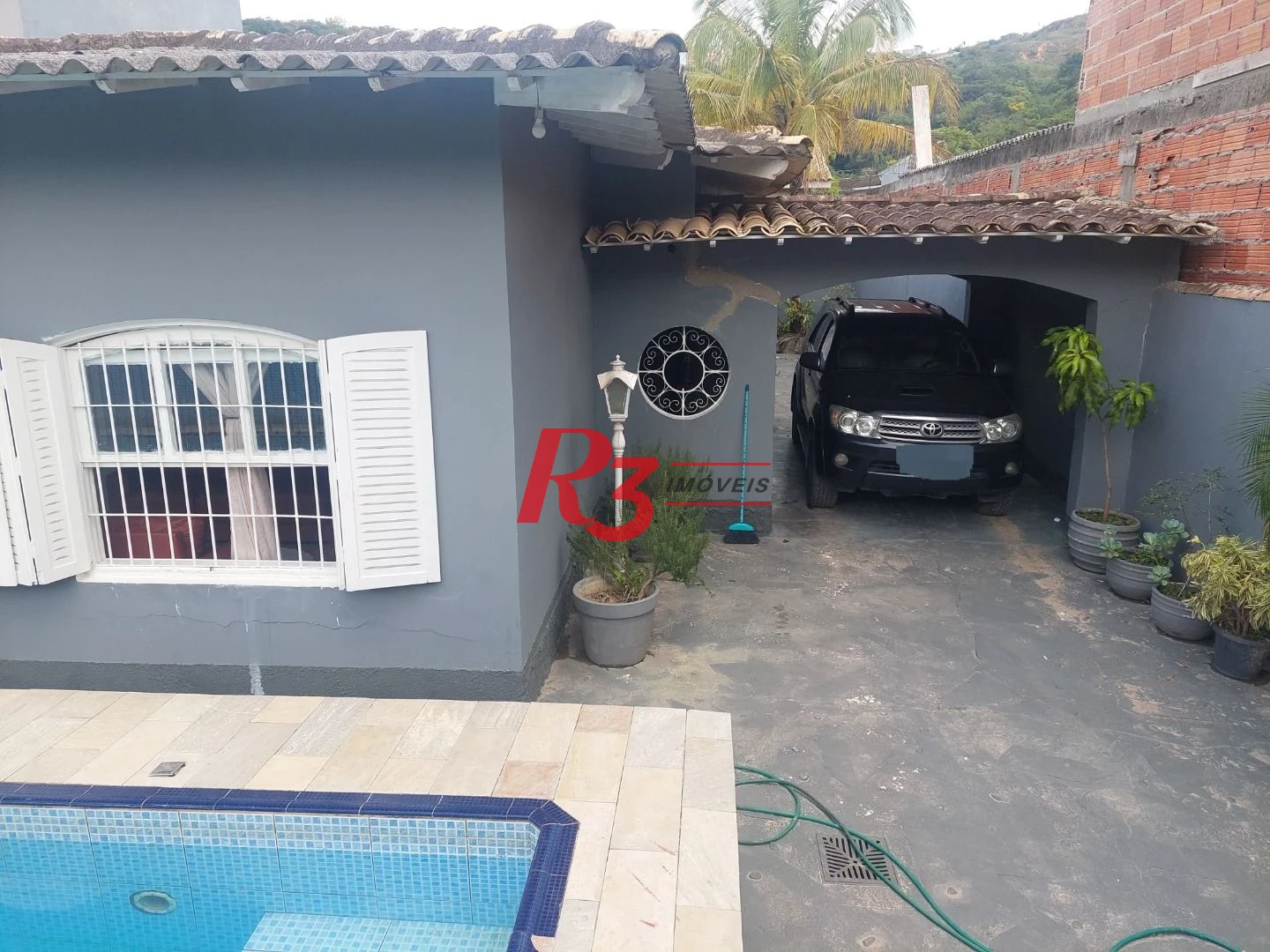 Casa com 4 dormitórios à venda, 375 m² por R$ 670.000,00 - Balneário Praia do Pernambuco - Guarujá/SP