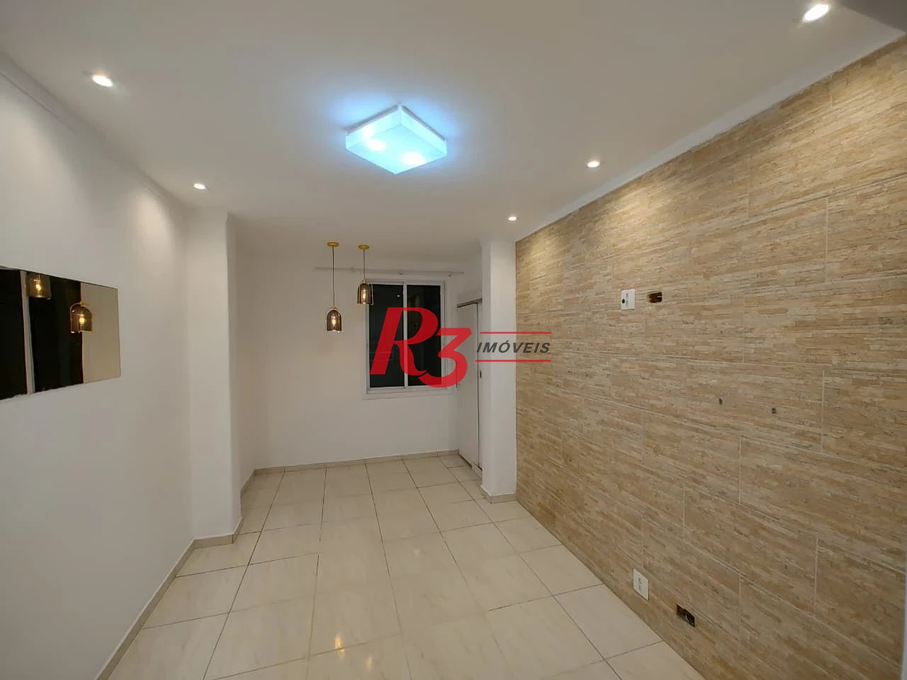 Apartamento com 2 dormitórios à venda, 56 m² por R$ 415.000,00 - José Menino - Santos/SP