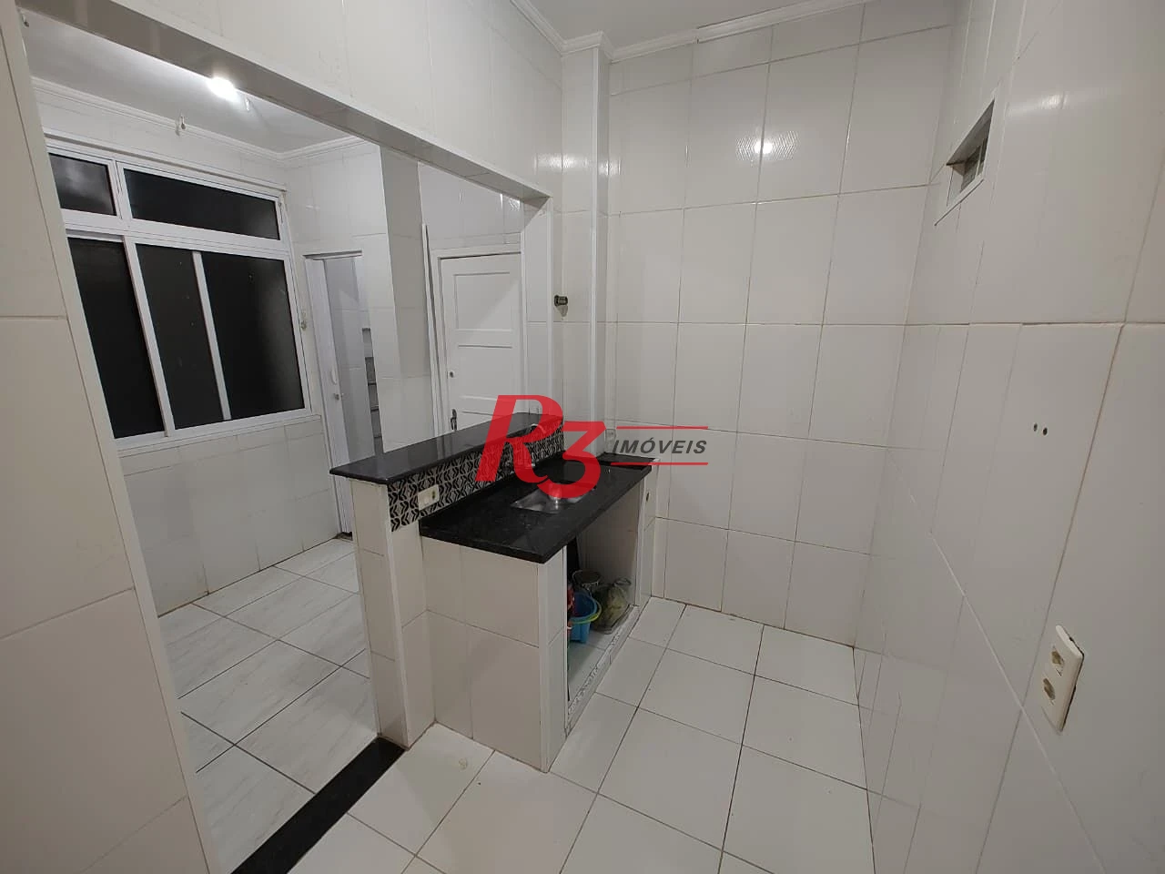 Apartamento com 2 dormitórios à venda, 56 m² por R$ 415.000,00 - José Menino - Santos/SP