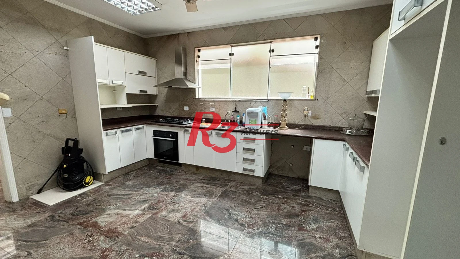 Sobrado com 3 dormitórios à venda, 329 m² por R$ 2.650.000,00 - Ponta da Praia - Santos/SP