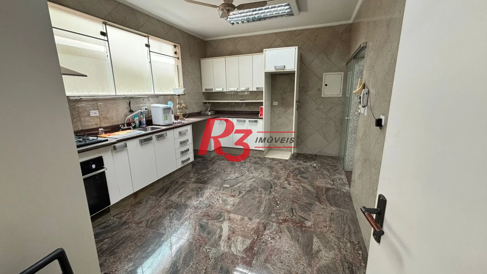 Sobrado com 3 dormitórios à venda, 329 m² por R$ 2.650.000,00 - Ponta da Praia - Santos/SP