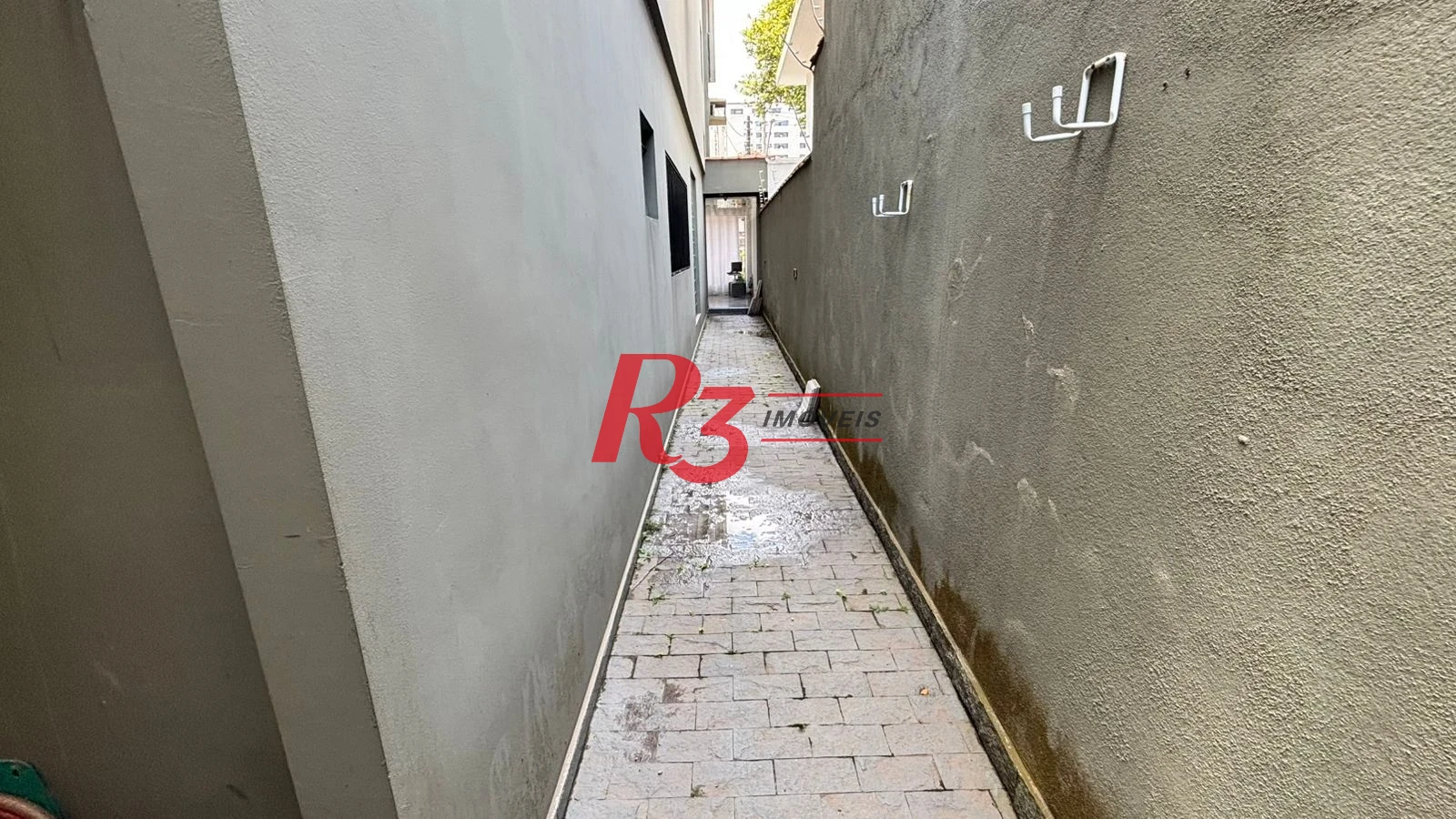 Sobrado com 3 dormitórios à venda, 329 m² por R$ 2.650.000,00 - Ponta da Praia - Santos/SP