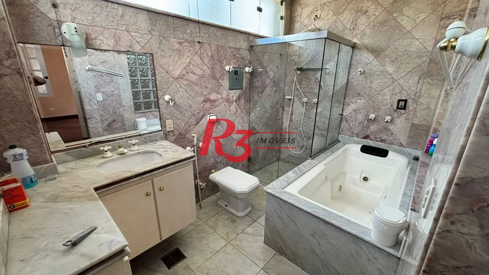 Sobrado com 3 dormitórios à venda, 329 m² por R$ 2.650.000,00 - Ponta da Praia - Santos/SP