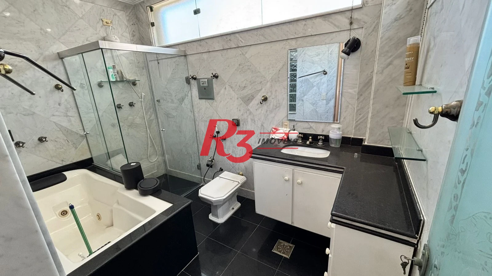 Sobrado com 3 dormitórios à venda, 329 m² por R$ 2.650.000,00 - Ponta da Praia - Santos/SP