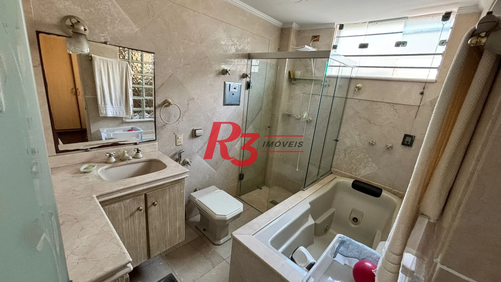 Sobrado com 3 dormitórios à venda, 329 m² por R$ 2.650.000,00 - Ponta da Praia - Santos/SP