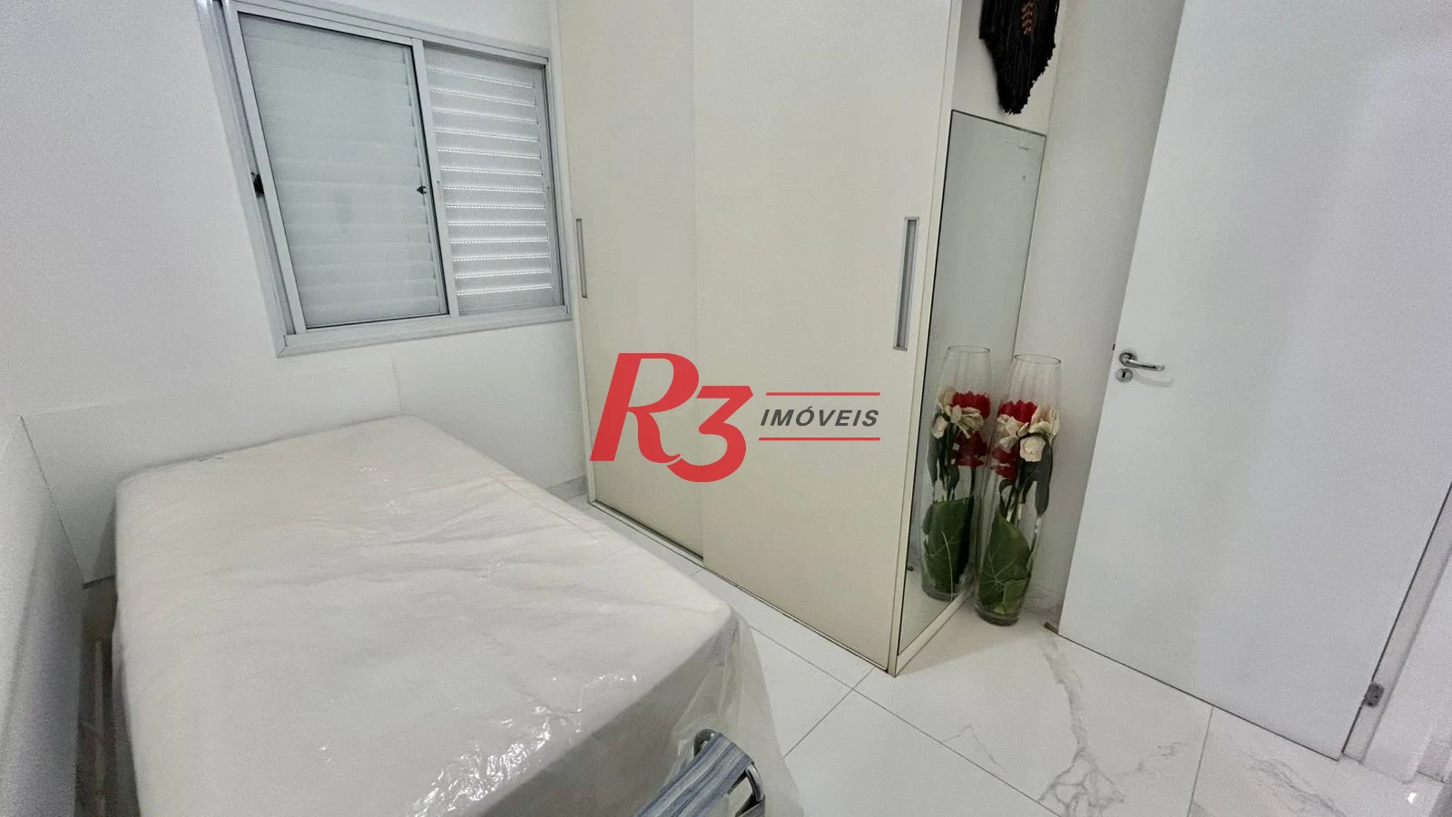 Apartamento com 2 dormitórios à venda, 70 m² por R$ 640.000,00 - Centro - São Vicente/SP