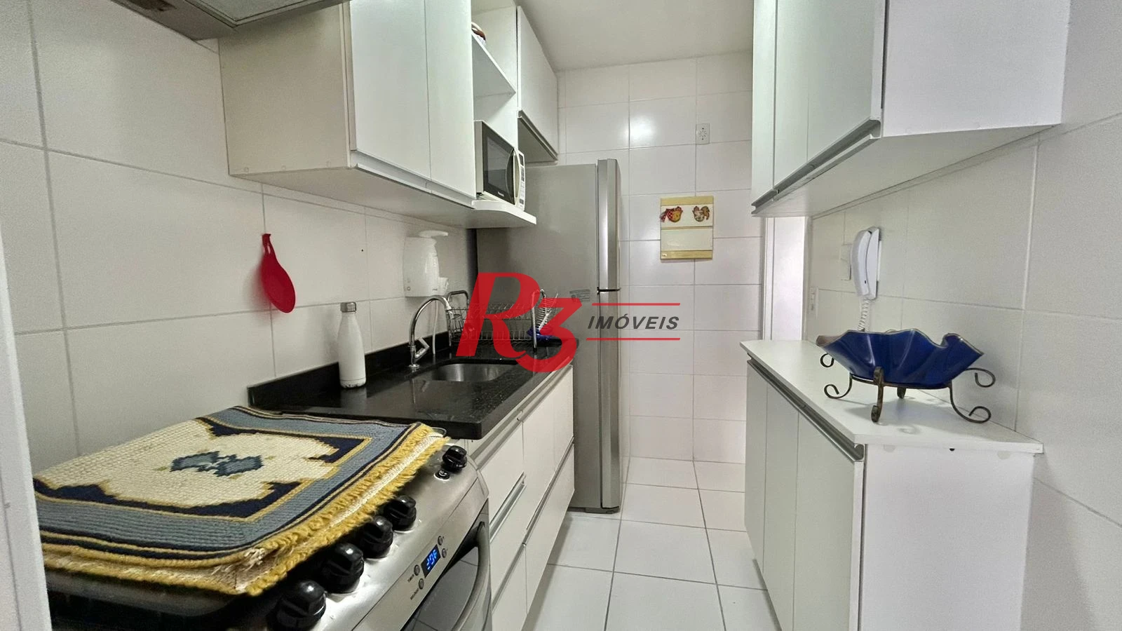 Apartamento com 2 dormitórios à venda, 70 m² por R$ 640.000,00 - Centro - São Vicente/SP