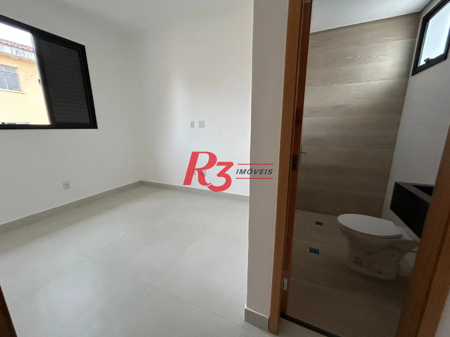 Casa com 2 dormitórios à venda, 90 m² por R$ 720.000,00 - Marapé - Santos/SP