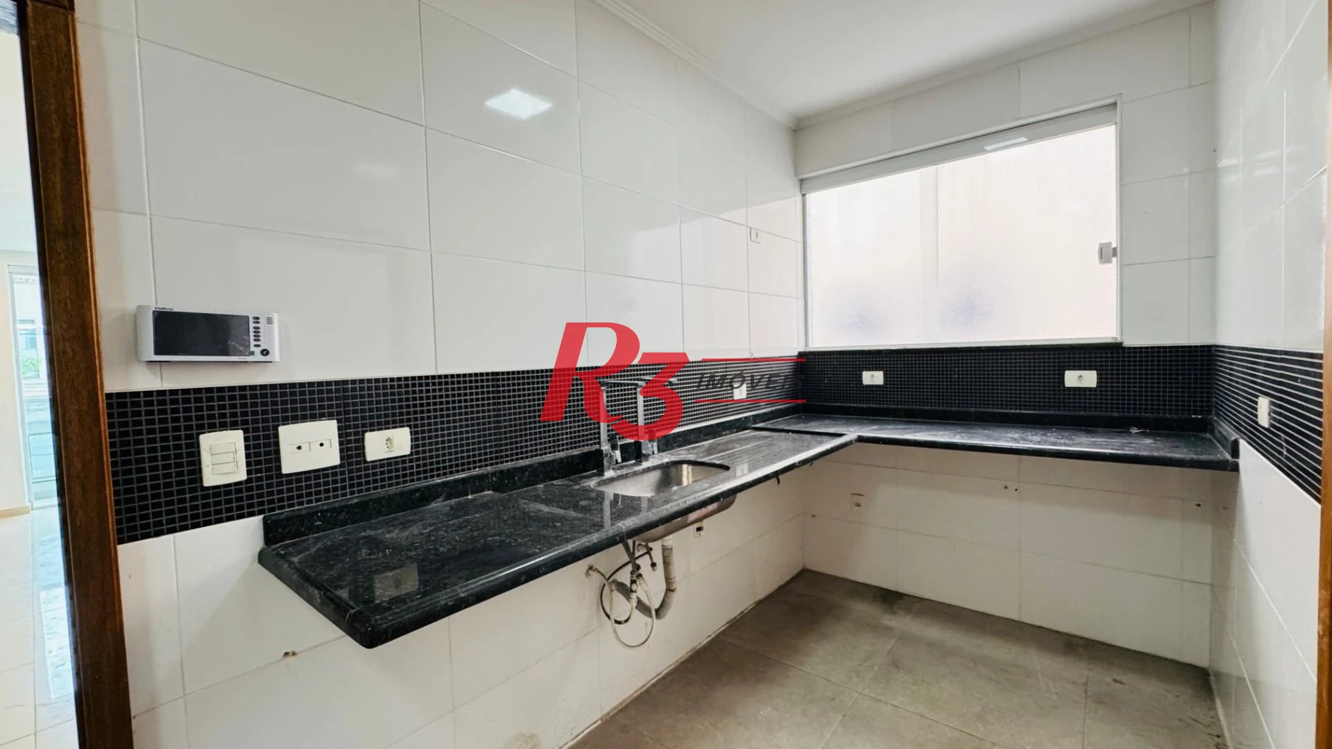Casa com 4 dormitórios à venda, 194 m² por R$ 1.800.000,00 - Gonzaga - Santos/SP
