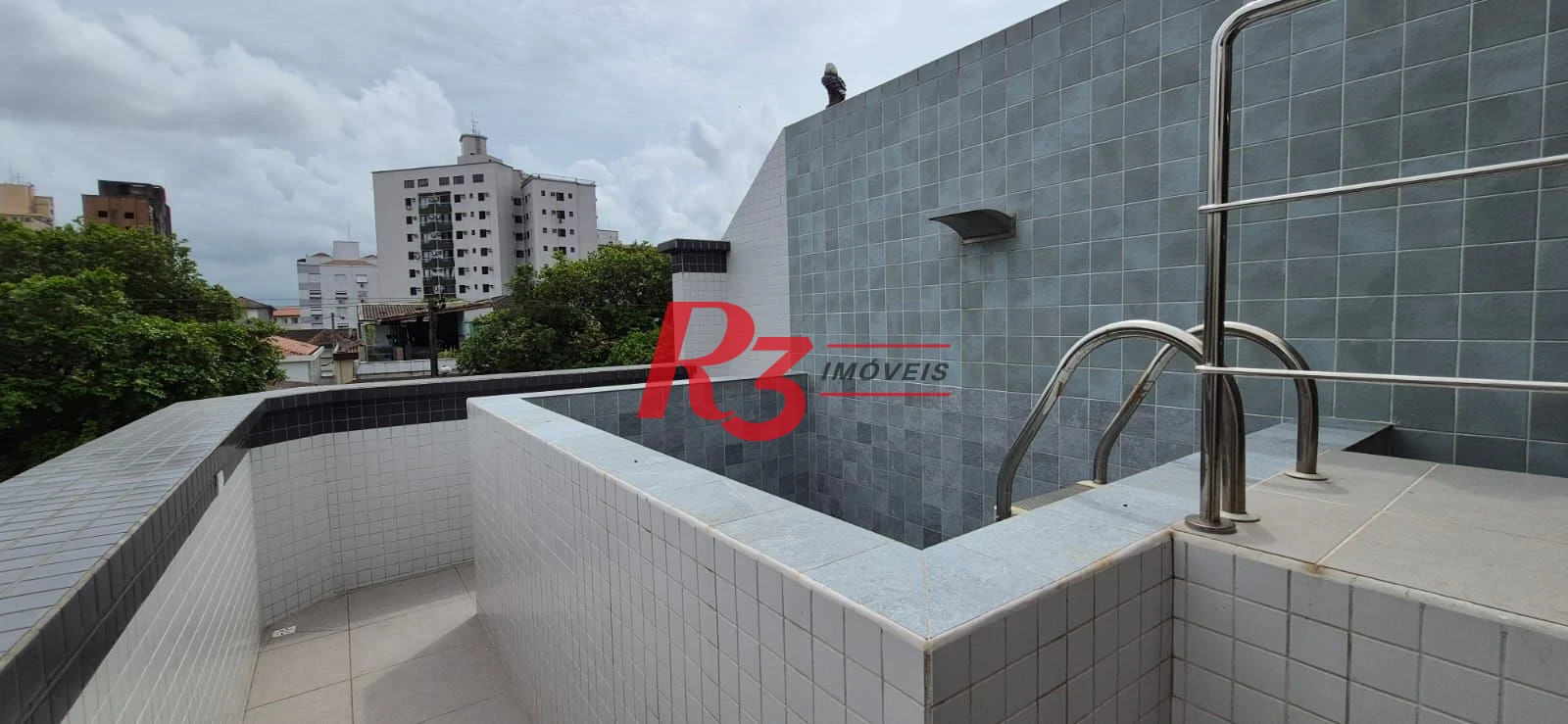 Casa com 3 dormitórios à venda, 155 m² por R$ 1.300.000,00 - Embaré - Santos/SP