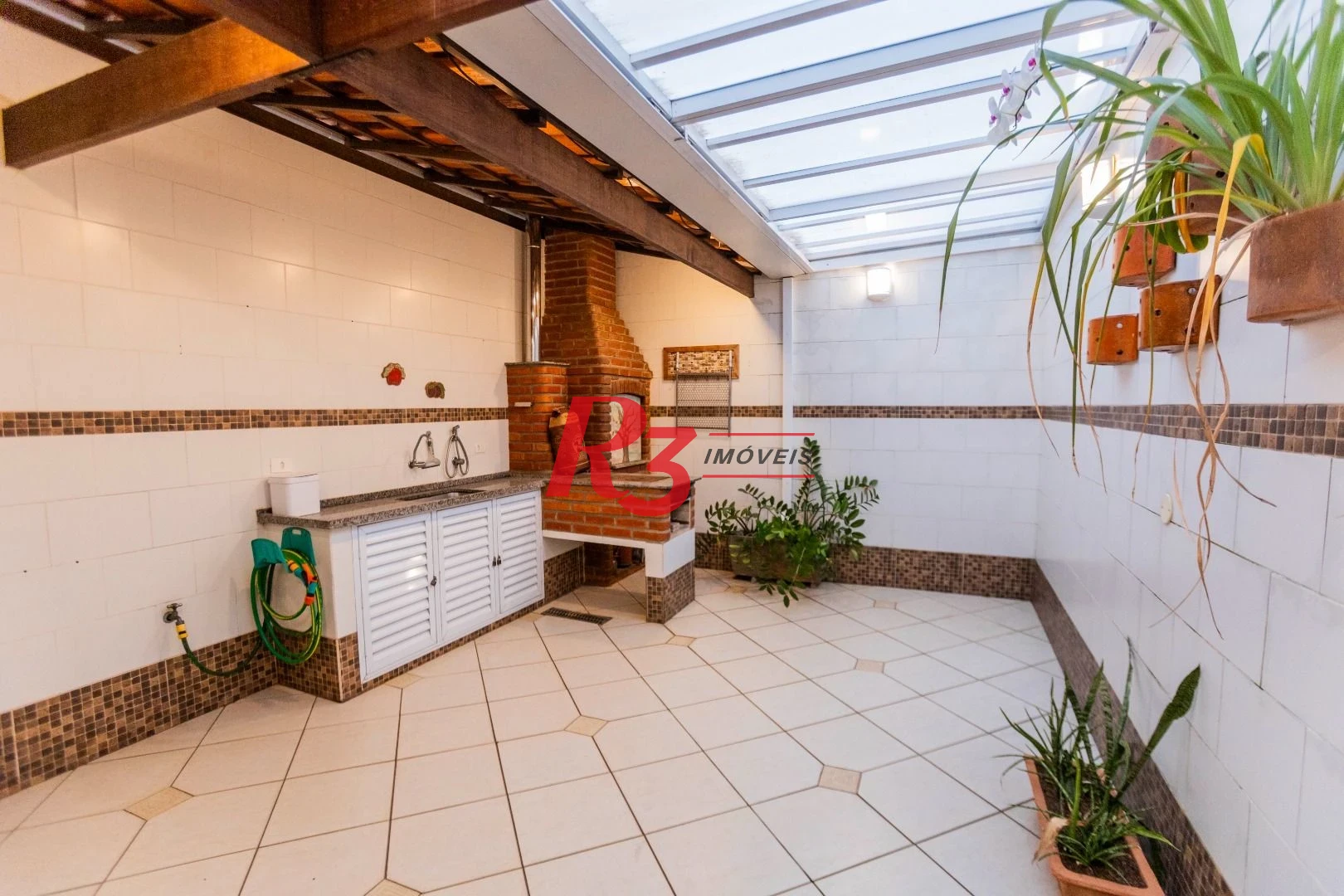 Casa à venda, 162 m² por R$ 990.000,00 - Estuário - Santos/SP