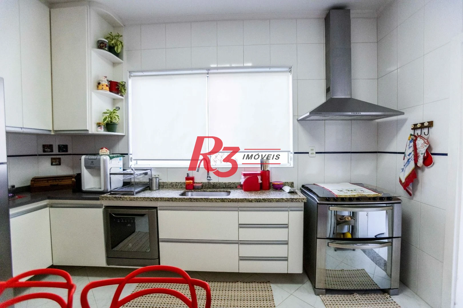 Casa à venda, 162 m² por R$ 990.000,00 - Estuário - Santos/SP
