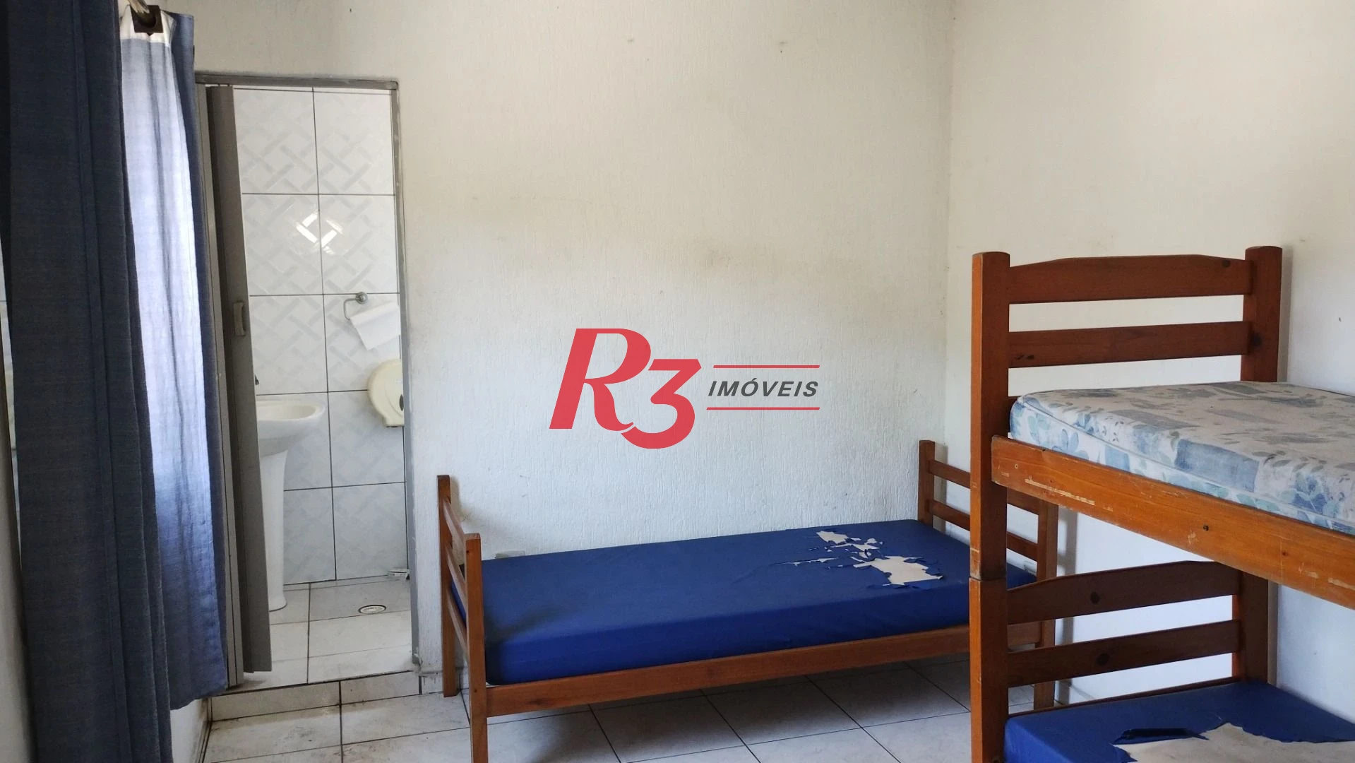 Sobrado com 3 dormitórios à venda, 283 m² por R$ 650.000,00 - Chico de Paula - Santos/SP