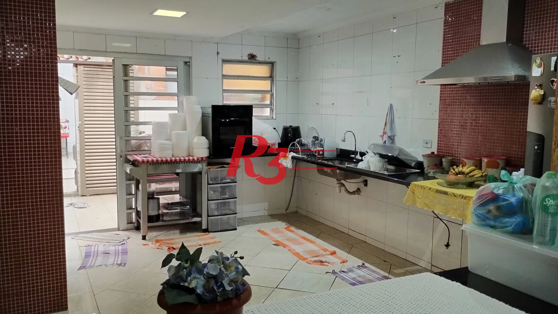 Sobrado com 3 dormitórios à venda, 283 m² por R$ 650.000,00 - Chico de Paula - Santos/SP