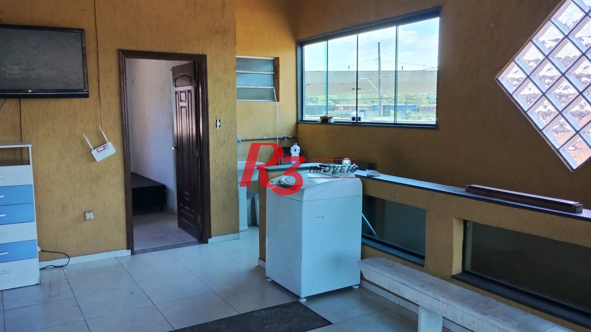 Sobrado com 3 dormitórios à venda, 283 m² por R$ 650.000,00 - Chico de Paula - Santos/SP