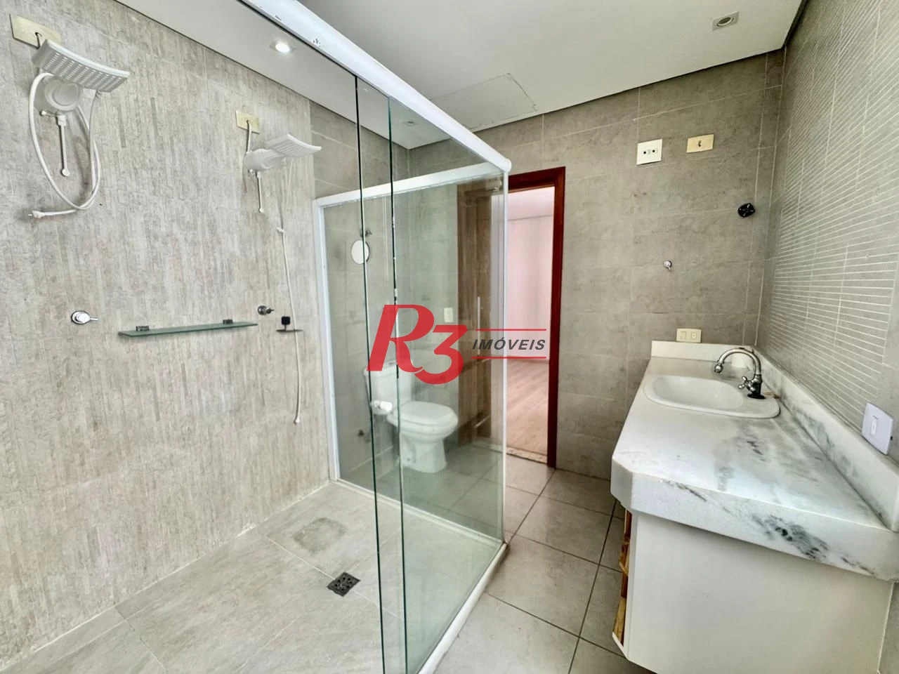 Casa com 3 dormitórios à venda, 231 m² por R$ 1.500.000,00 - Gonzaguinha - São Vicente/SP