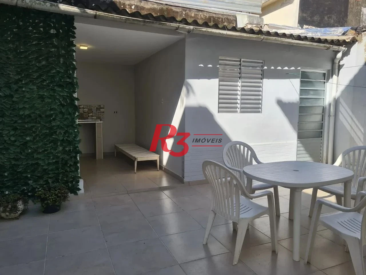 Sobrado com 4 dormitórios à venda, 210 m² por R$ 1.350.000,00 - Embaré - Santos/SP
