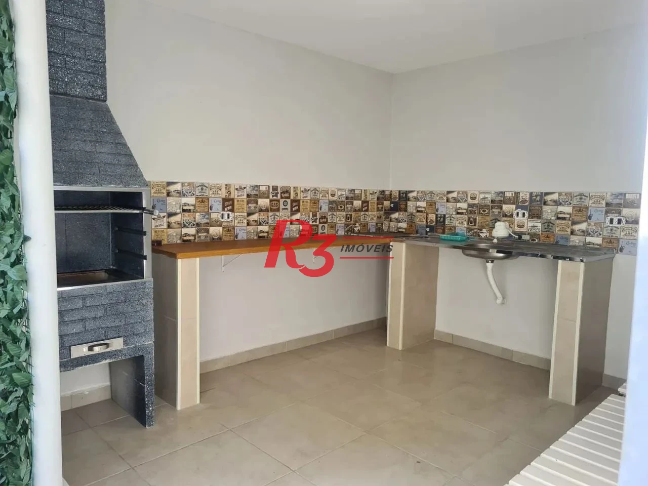 Sobrado com 4 dormitórios à venda, 210 m² por R$ 1.350.000,00 - Embaré - Santos/SP