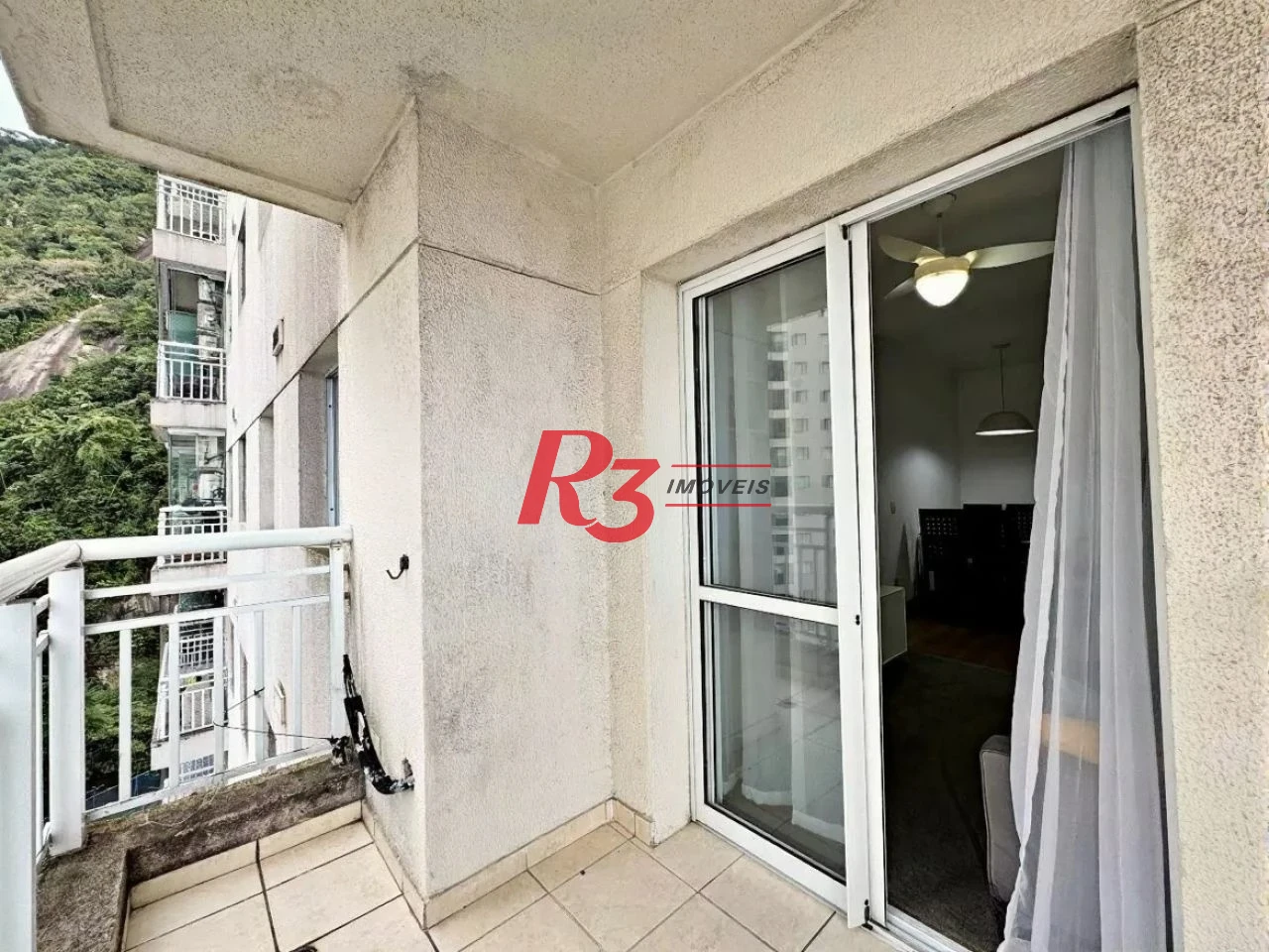 Apartamento com 2 dormitórios à venda, 64 m² por R$ 600.000,00 - Marapé - Santos/SP