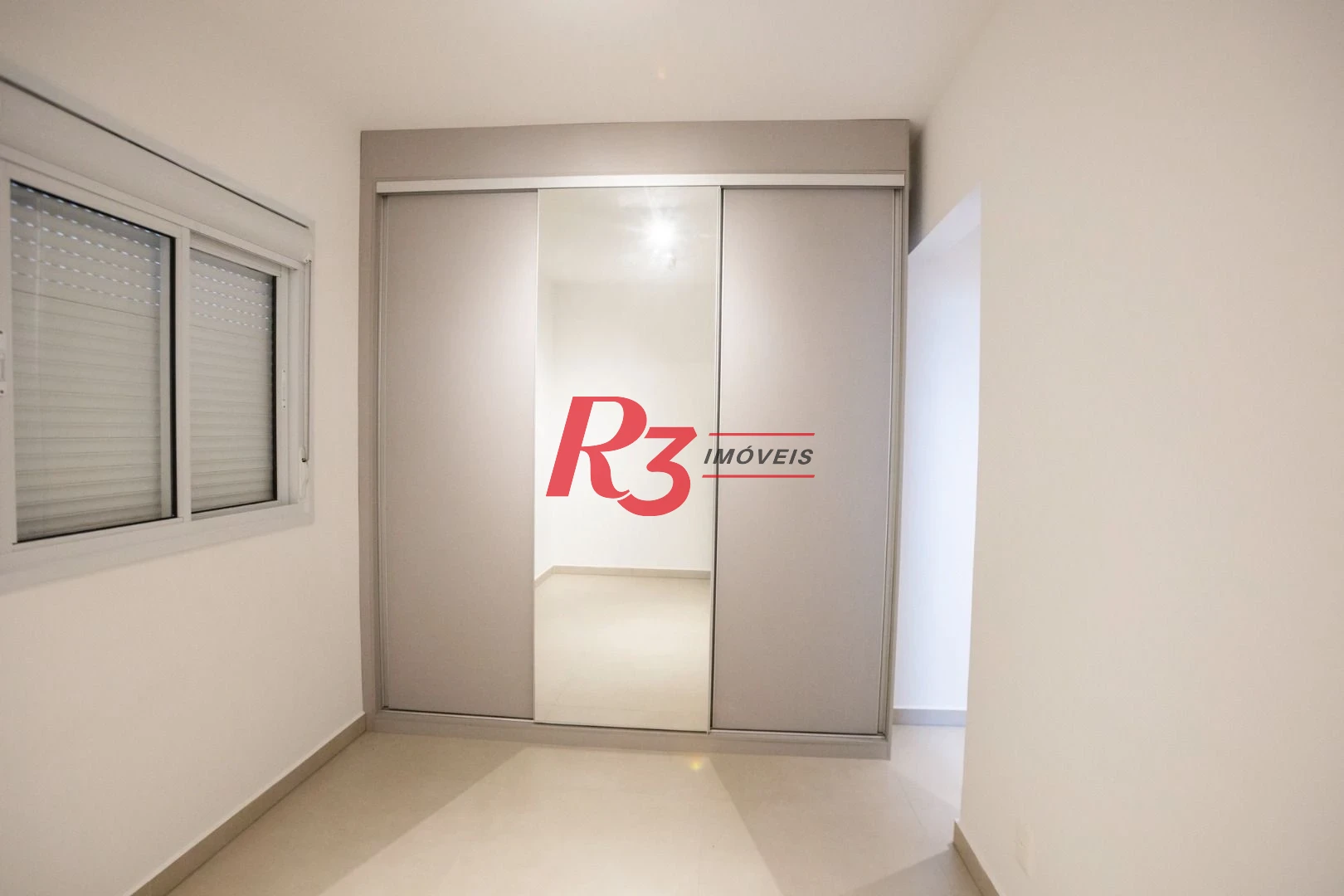 Apartamento com 2 dormitórios à venda, 74 m² por R$ 1.065.000,00 - Boqueirão - Santos/SP
