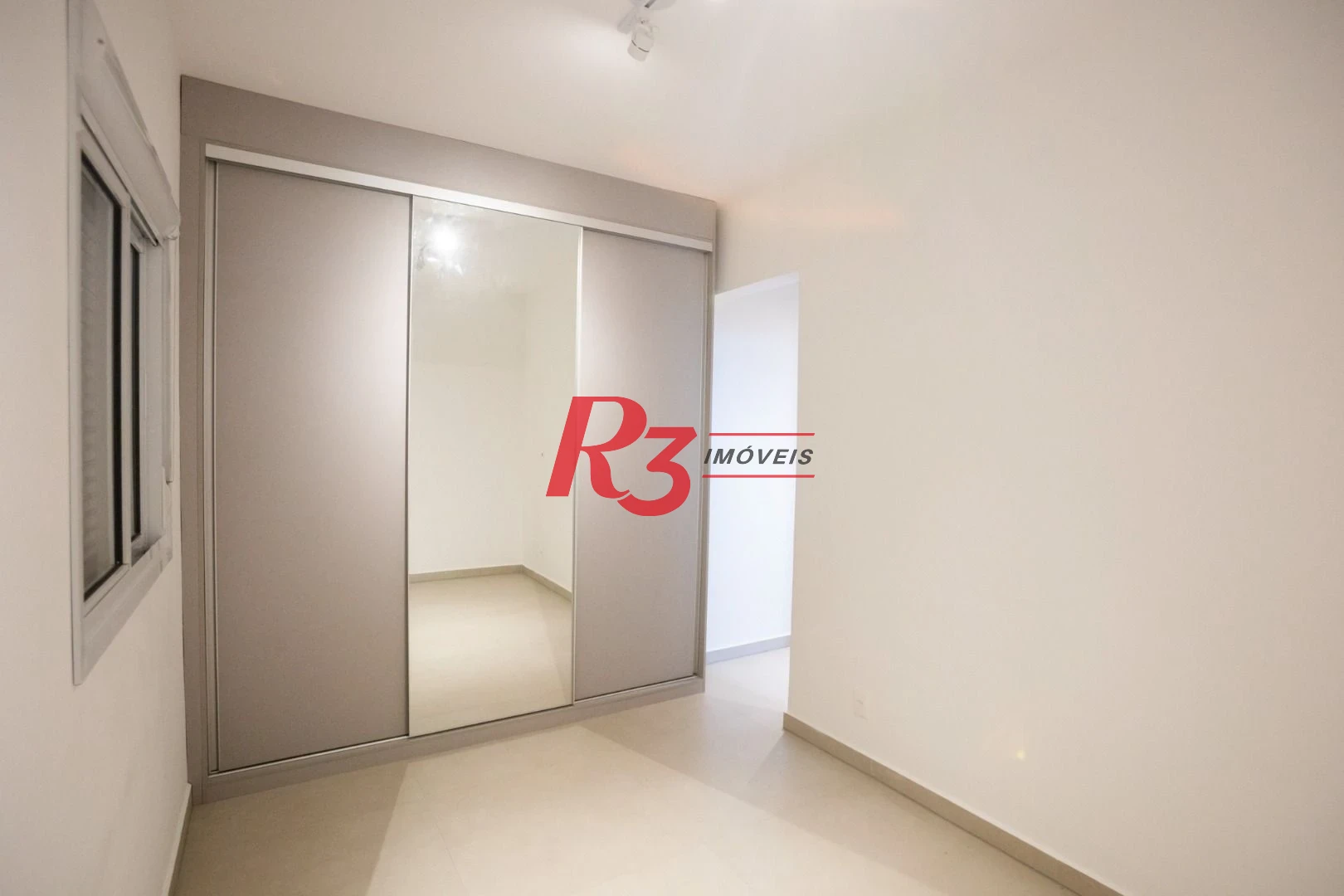 Apartamento com 2 dormitórios à venda, 74 m² por R$ 1.065.000,00 - Boqueirão - Santos/SP