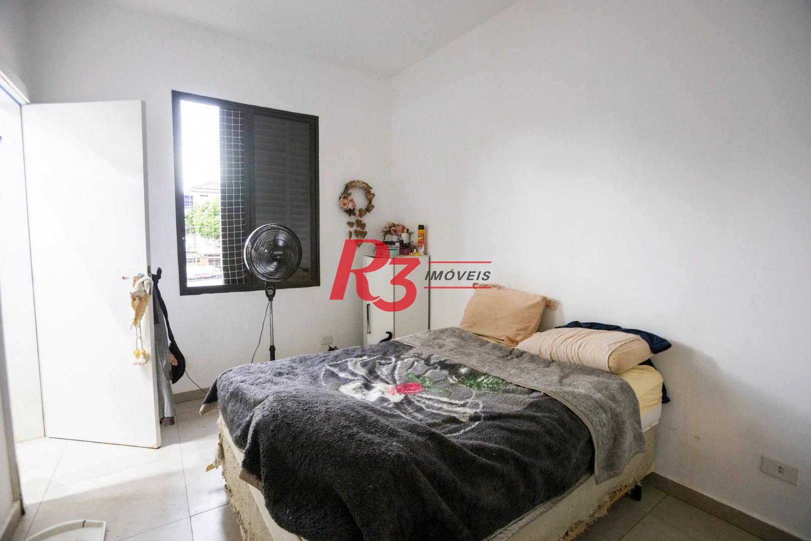 Casa com 2 dormitórios à venda, 89 m² por R$ 430.000,00 - Embaré - Santos/SP