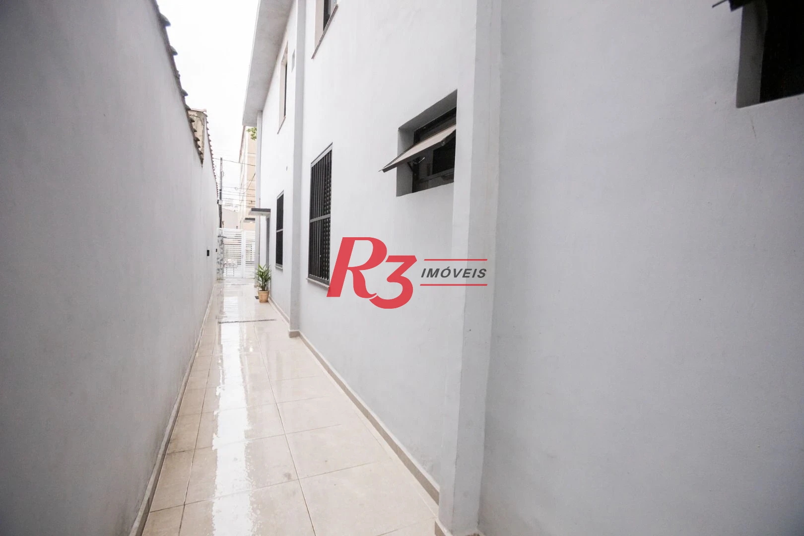 Casa com 2 dormitórios à venda, 89 m² por R$ 430.000,00 - Embaré - Santos/SP