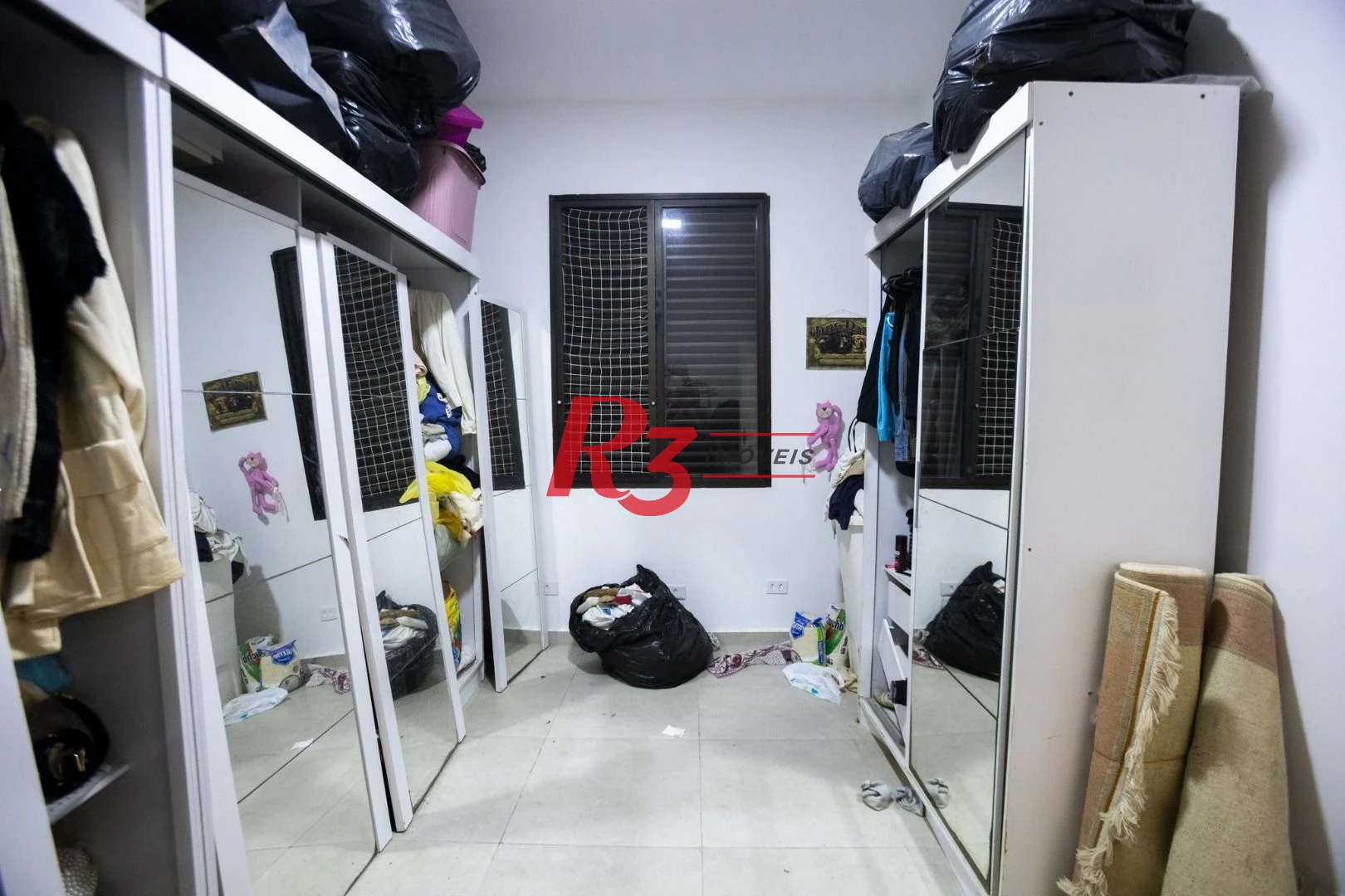 Casa com 2 dormitórios à venda, 89 m² por R$ 430.000,00 - Embaré - Santos/SP