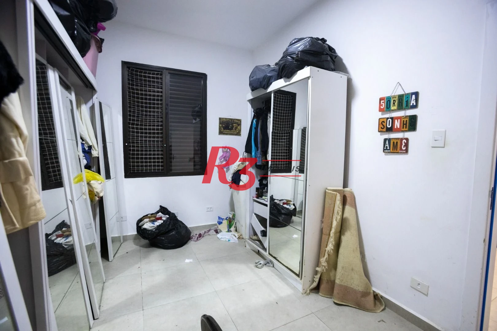 Casa com 2 dormitórios à venda, 89 m² por R$ 430.000,00 - Embaré - Santos/SP