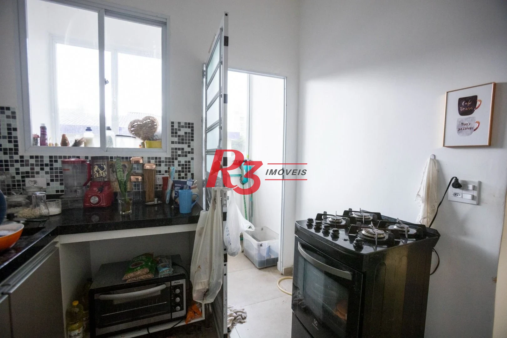 Casa com 2 dormitórios à venda, 89 m² por R$ 430.000,00 - Embaré - Santos/SP