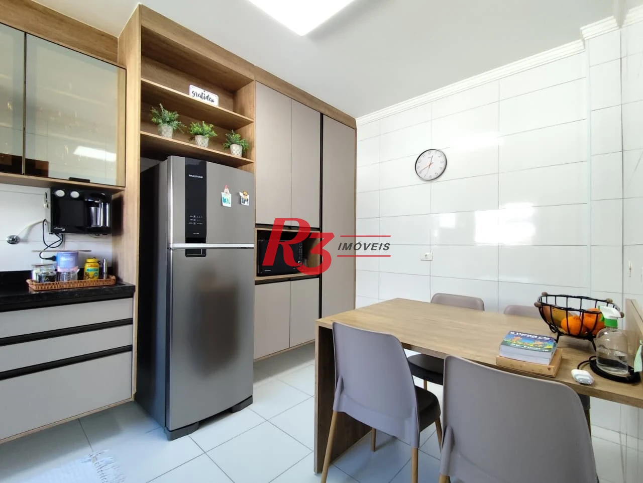 Casa com 3 dormitórios à venda, 165 m² por R$ 1.100.000,00 - Marapé - Santos/SP
