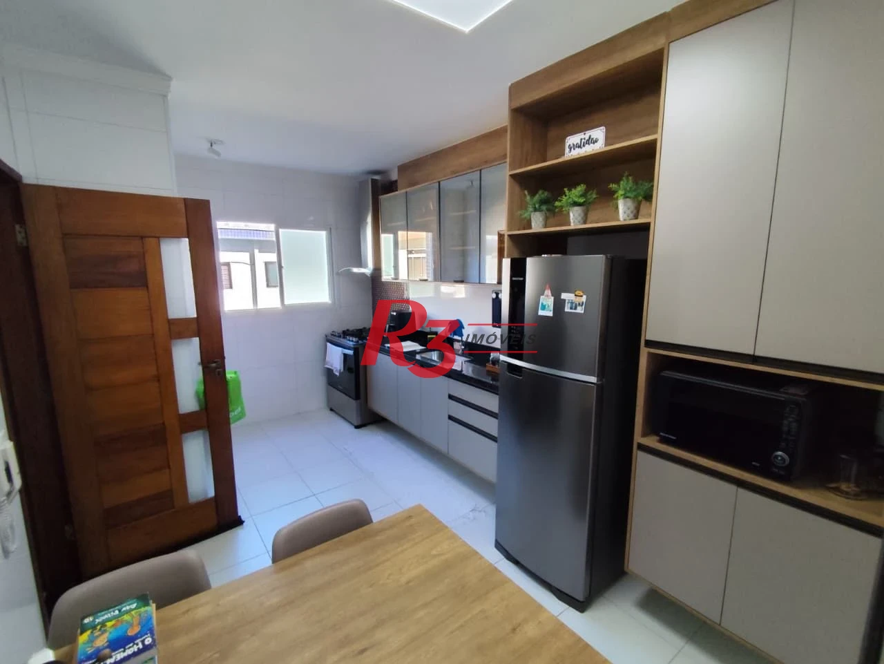 Casa com 3 dormitórios à venda, 165 m² por R$ 1.100.000,00 - Marapé - Santos/SP