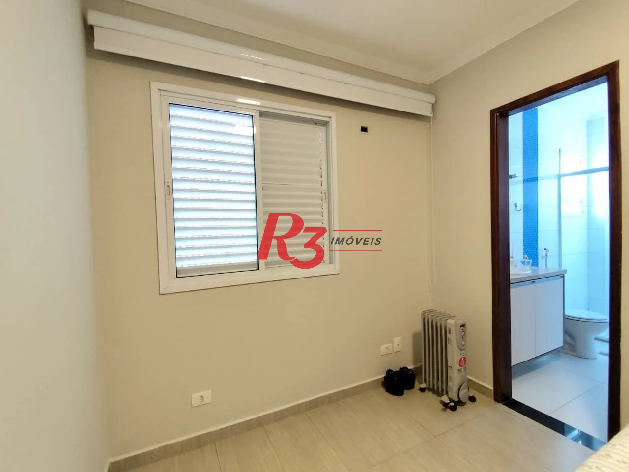 Casa com 3 dormitórios à venda, 165 m² por R$ 1.100.000,00 - Marapé - Santos/SP