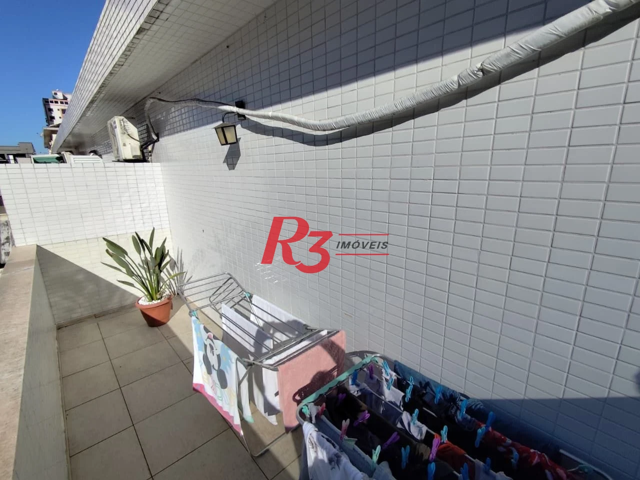 Casa com 3 dormitórios à venda, 165 m² por R$ 1.100.000,00 - Marapé - Santos/SP