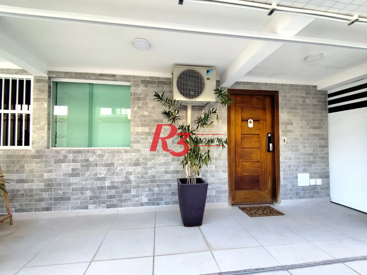 Casa com 3 dormitórios à venda, 165 m² por R$ 1.100.000,00 - Marapé - Santos/SP