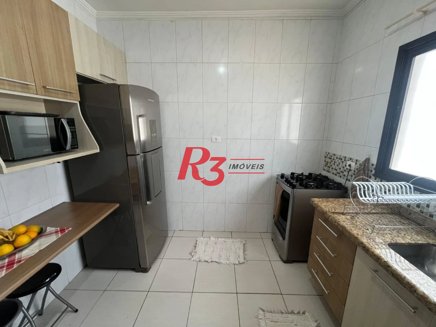 Casa com 3 dormitórios à venda, 141 m² por R$ 680.000,00 - Centro - São Vicente/SP