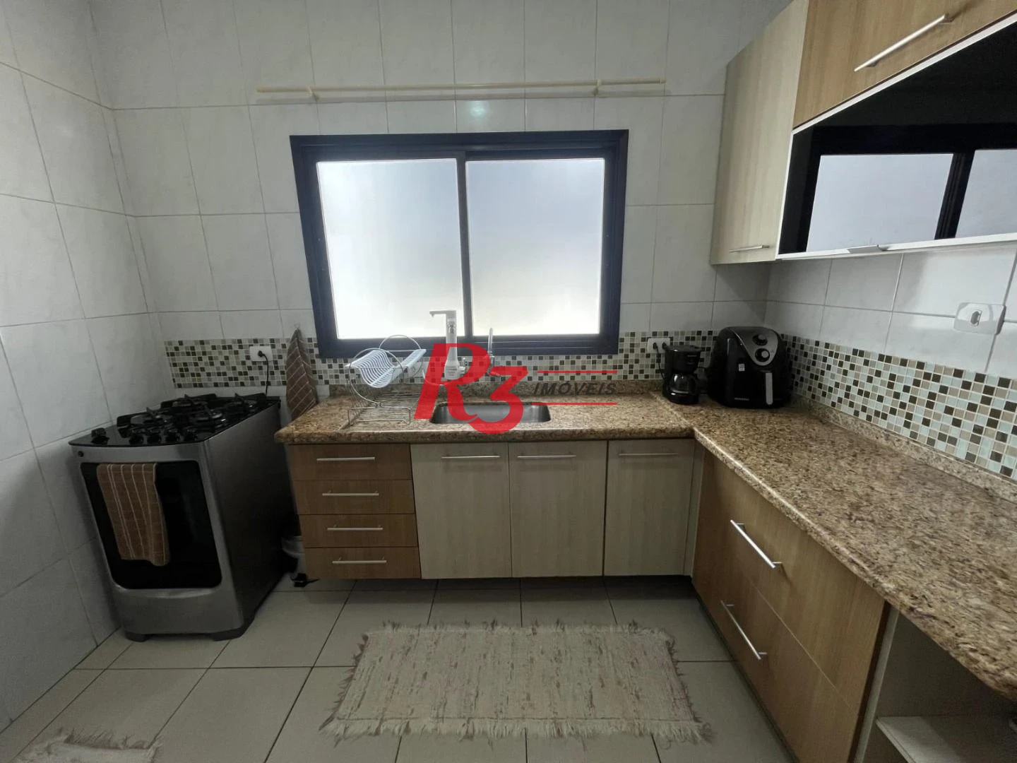 Casa com 3 dormitórios à venda, 141 m² por R$ 680.000,00 - Centro - São Vicente/SP