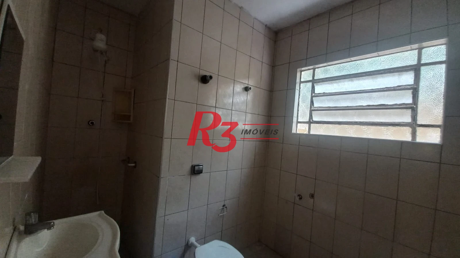 Apartamento com 2 dormitórios à venda, 74 m² por R$ 360.000,00 - Gonzaga - Santos/SP