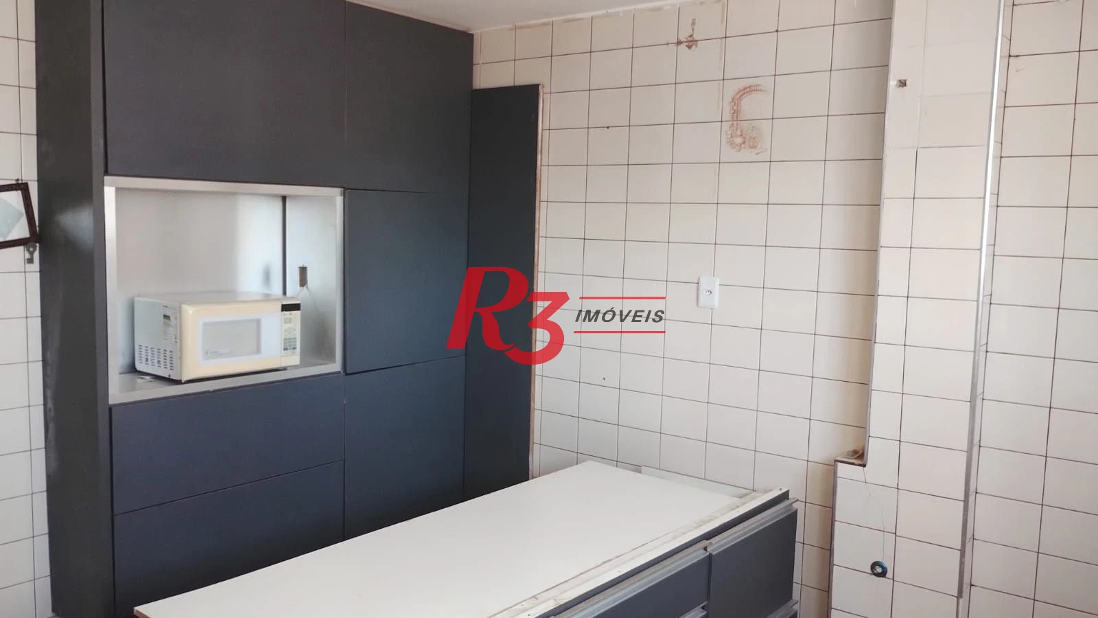Apartamento com 3 dormitórios à venda, 107 m² por R$ 410.000,00 - Centro - São Vicente/SP
