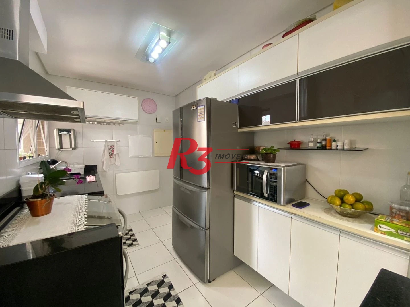 Apartamento com 3 dormitórios à venda, 100 m² por R$ 1.300.000,00 - José Menino - Santos/SP