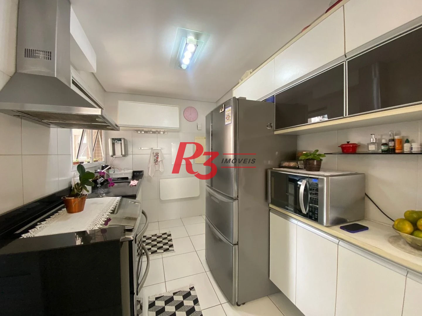 Apartamento com 3 dormitórios à venda, 100 m² por R$ 1.300.000,00 - José Menino - Santos/SP