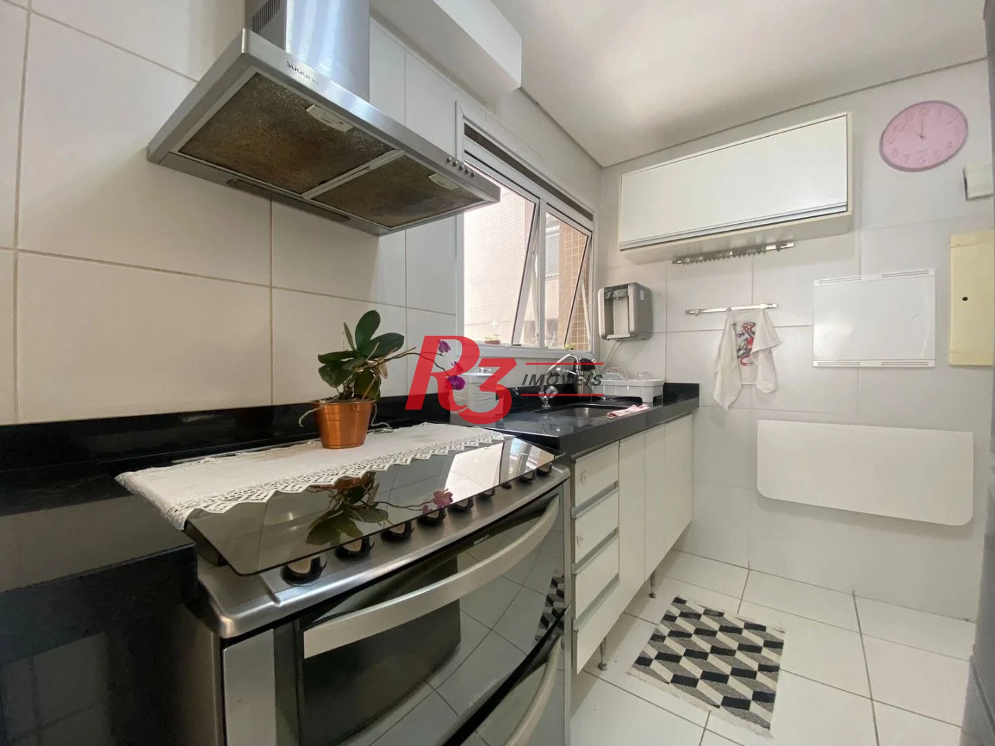 Apartamento com 3 dormitórios à venda, 100 m² por R$ 1.300.000,00 - José Menino - Santos/SP