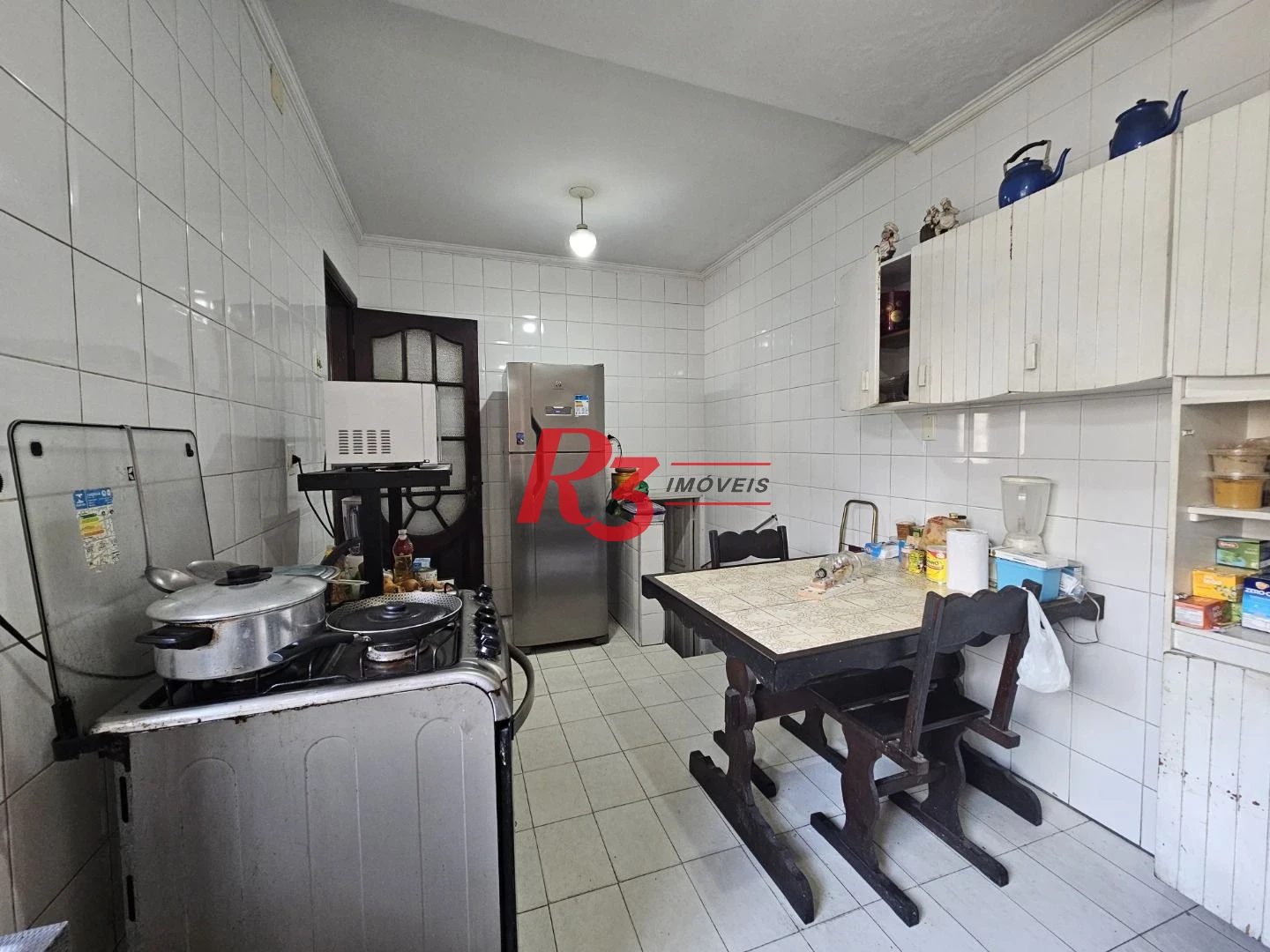 Sobrado com 3 dormitórios à venda, 150 m² por R$ 1.300.000,00 - Pompéia - Santos/SP