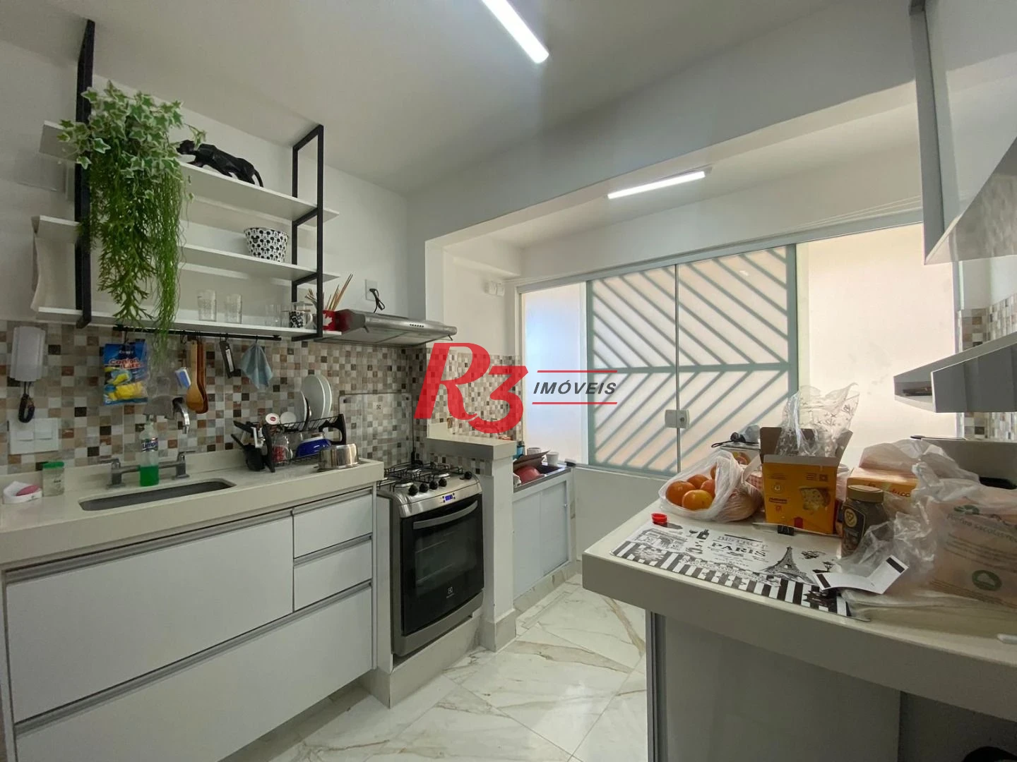 Apartamento com 2 dormitórios à venda, 59 m² por R$ 648.000,00 - Gonzaga - Santos/SP