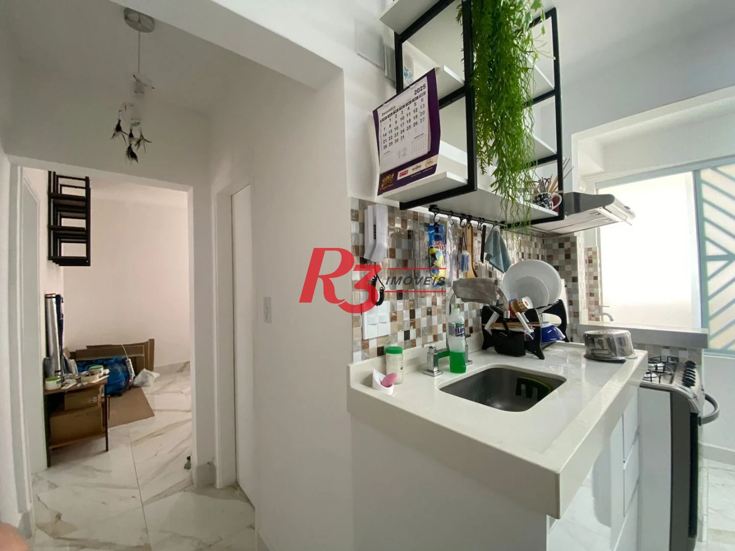 Apartamento com 2 dormitórios à venda, 59 m² por R$ 648.000,00 - Gonzaga - Santos/SP