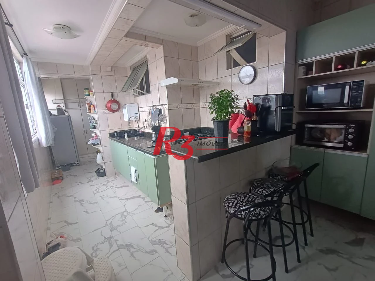 Apartamento com 3 dormitórios à venda, 110 m² por R$ 480.000,00 - Centro - São Vicente/SP