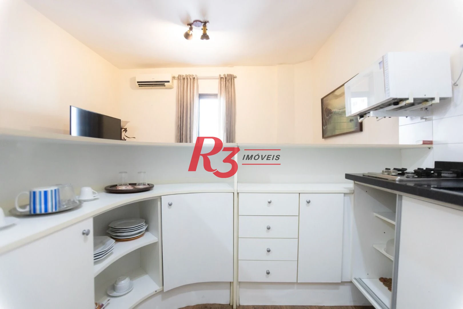 Flat com 1 dormitório à venda, 50 m² por R$ 270.000,00 - Gonzaga - Santos/SP